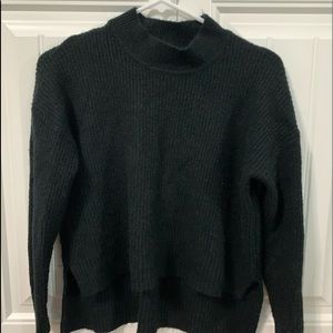 Black turtle neck sweater junior large or fits like a small that’s cropped